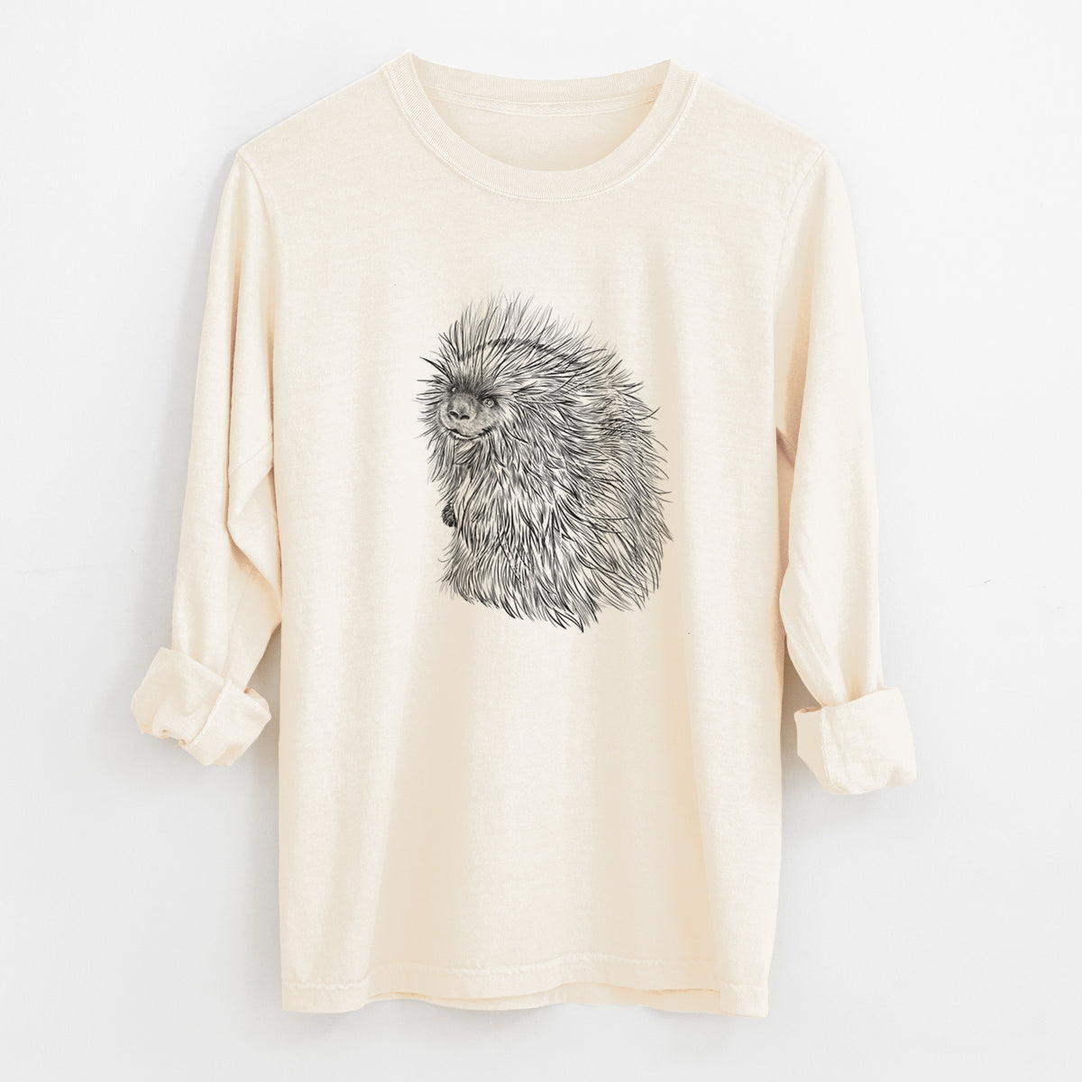 Ivory Comfort Colors long sleeve shirt laid flat with the cuffs rolled, printed with a detailed black ink illustration of a porcupine with its quills raised.