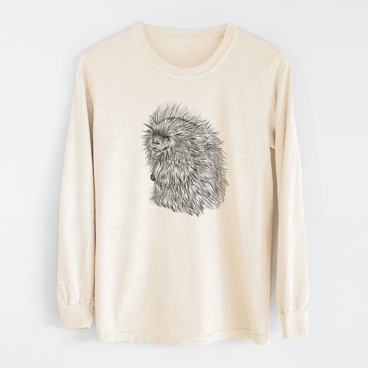 Ivory Comfort Colors long sleeve shirt laid flat, printed with a detailed black ink illustration of a porcupine with its quills raised.