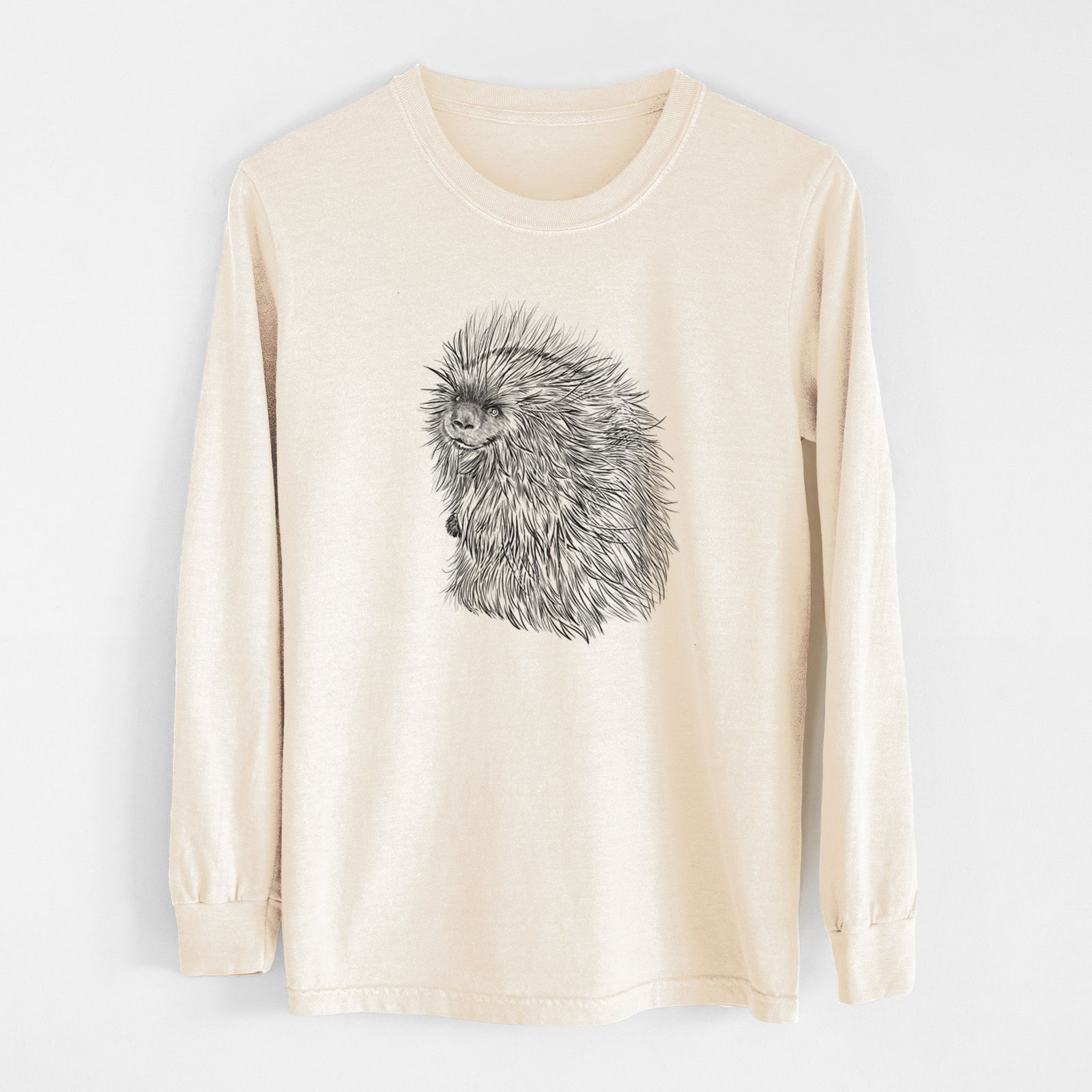 Ivory Comfort Colors long sleeve shirt laid flat, printed with a detailed black ink illustration of a porcupine with its quills raised.