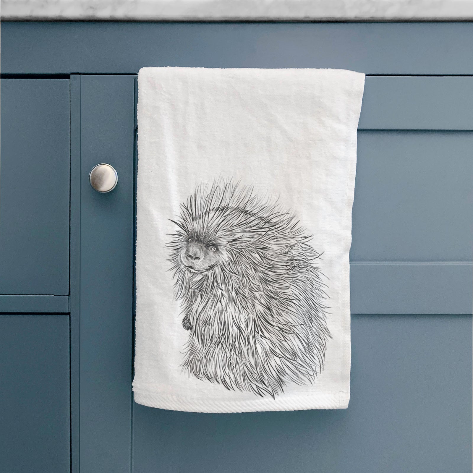 White hand towel printed with a detailed black ink illustration of a porcupine with its quills raised.