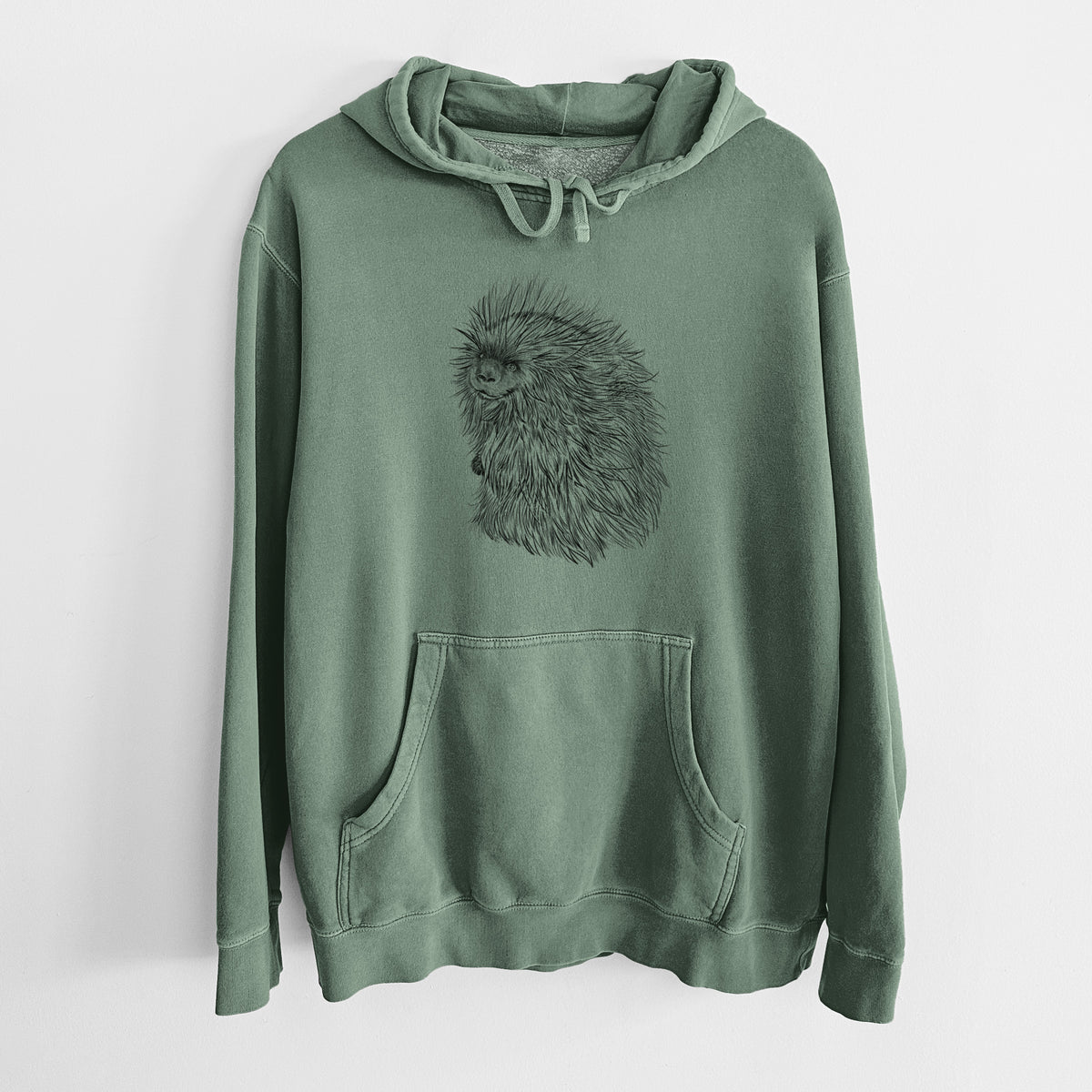 Alpine green pigment dyed hoodie laid flat, printed with a detailed black ink illustration of a porcupine with its quills raised.