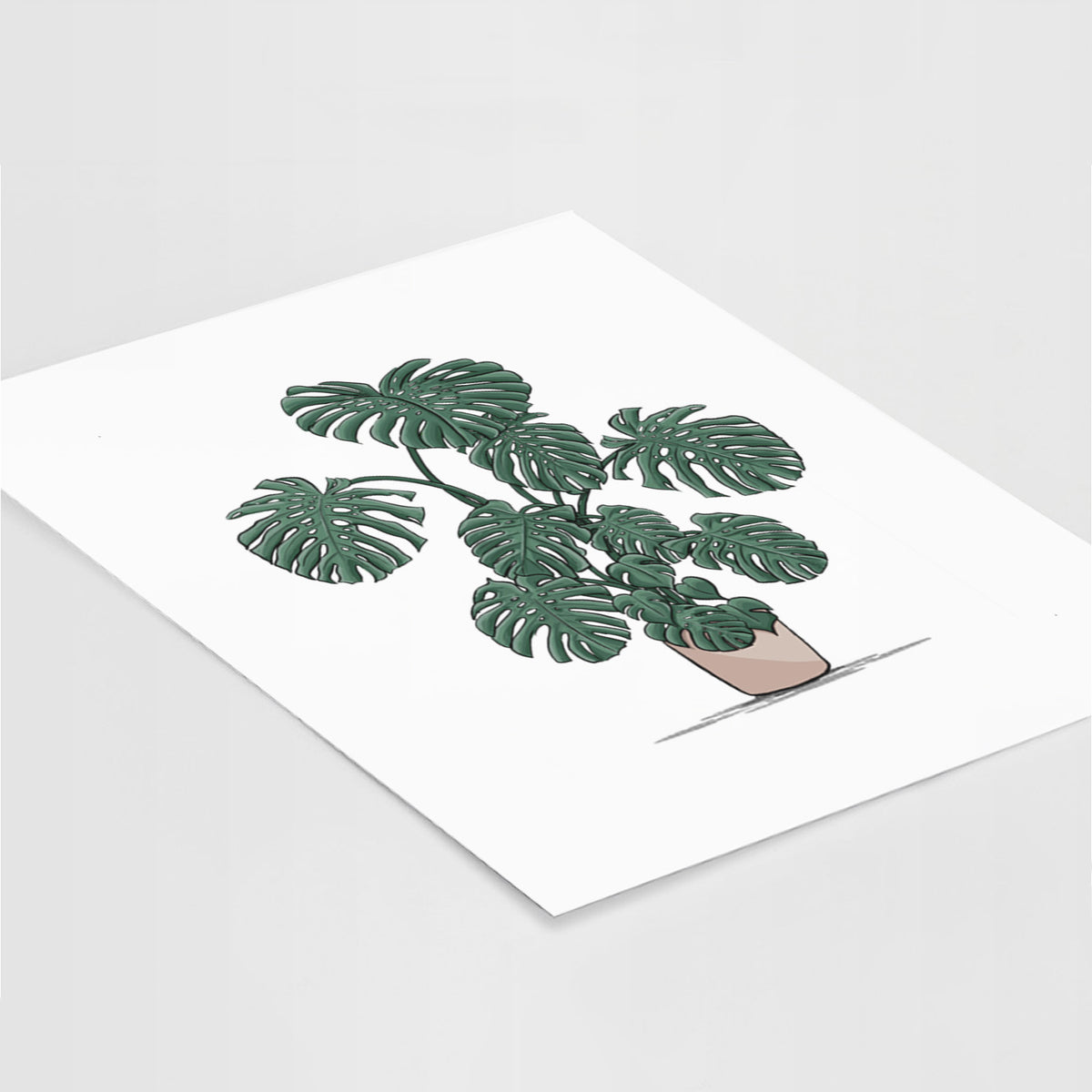 Art print of a full-color illustration of a large potted Monstera plant, lying at an angle on a white surface.
