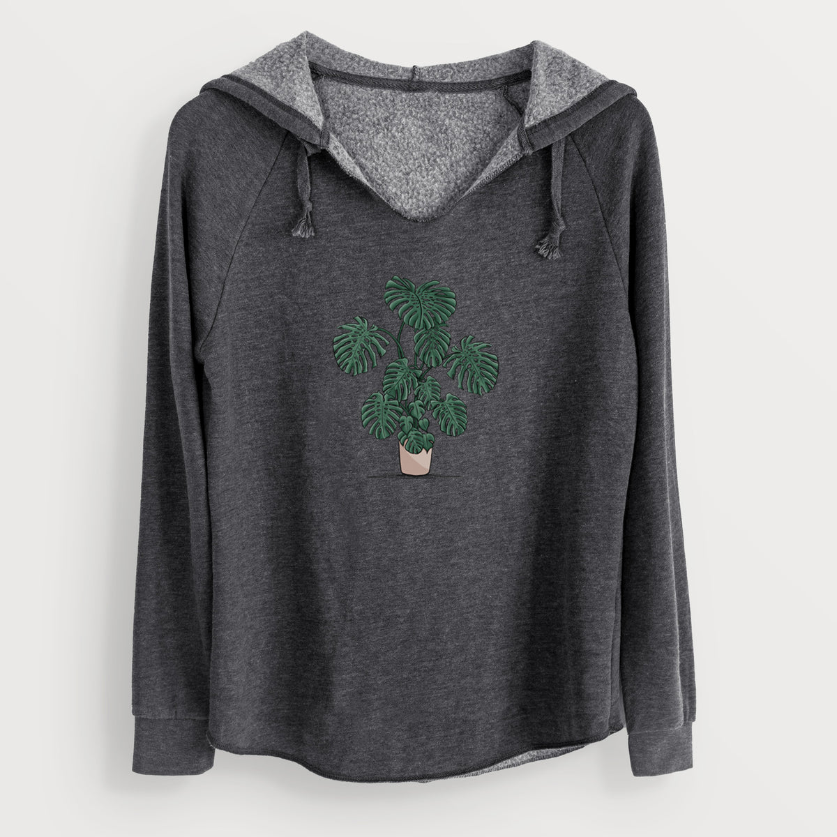 Charcoal grey women's Cali Wave hooded sweatshirt laid flat, printed with a full-color illustration of a large potted Monstera plant.