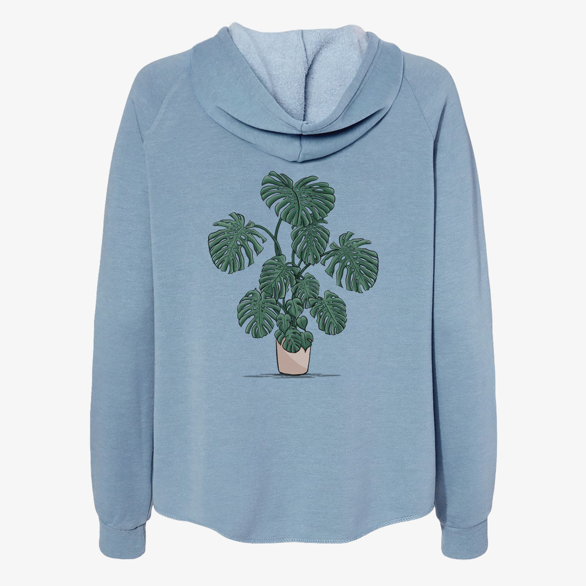 Misty blue women's Cali Wave zip-up sweatshirt laid flat, printed with a full-color illustration of a large potted Monstera plant.