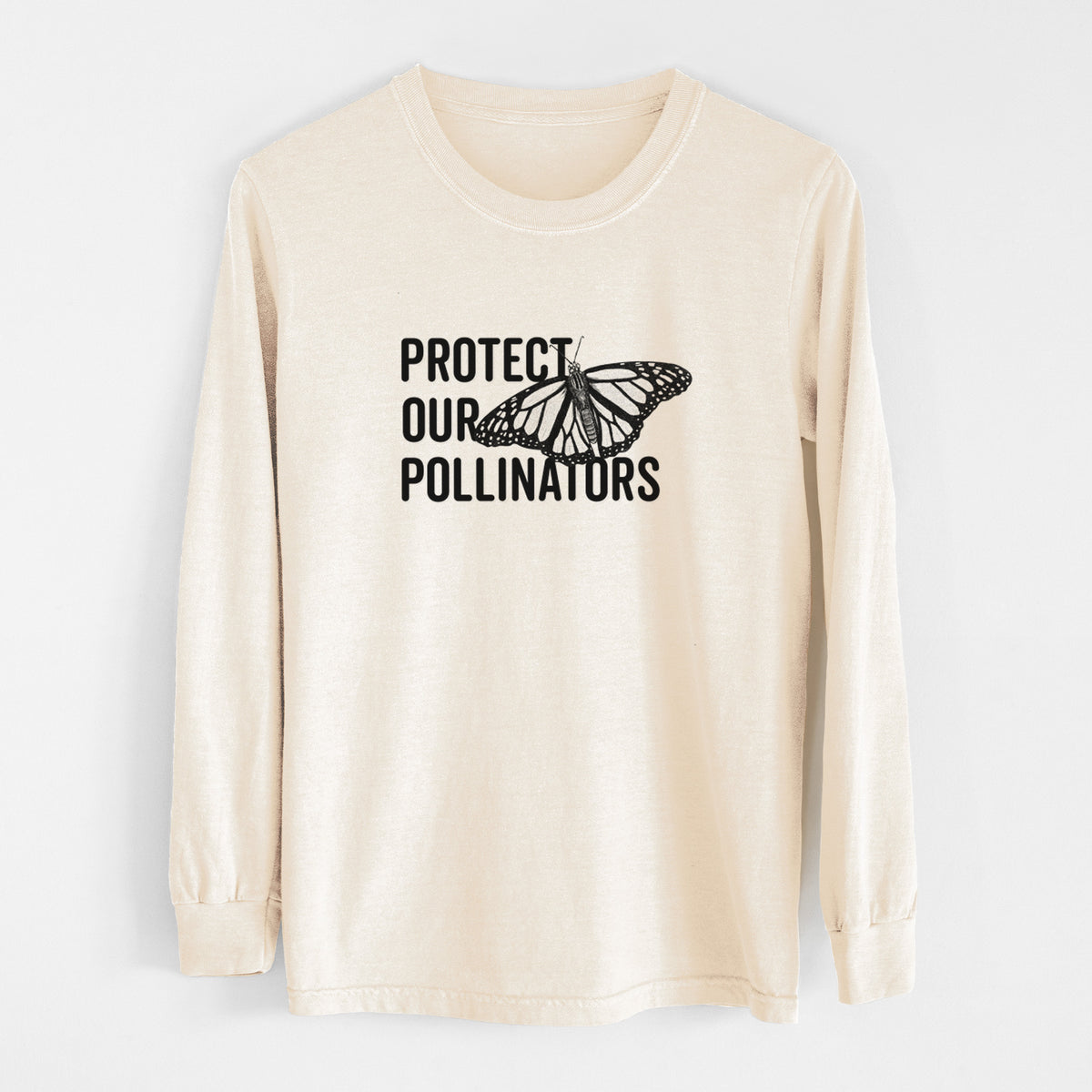 Ivory Comfort Colors long sleeve shirt laid flat, printed with bold black words reading Protect Our Pollinators beside a monarch butterfly.