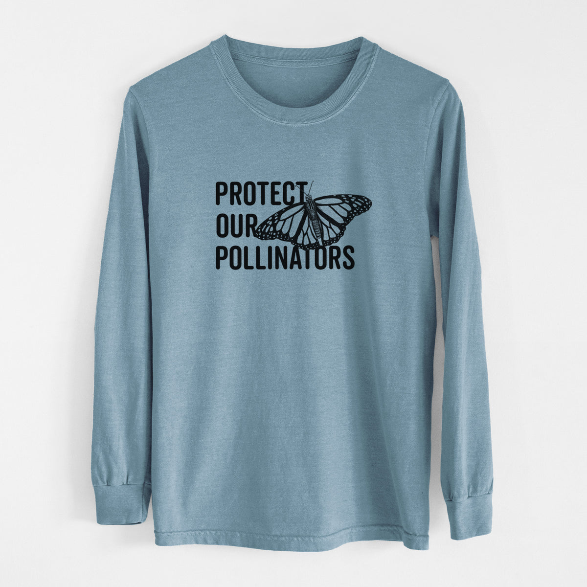Steel blue Comfort Colors long sleeve shirt laid flat, printed with bold black words reading Protect Our Pollinators beside a monarch butterfly.