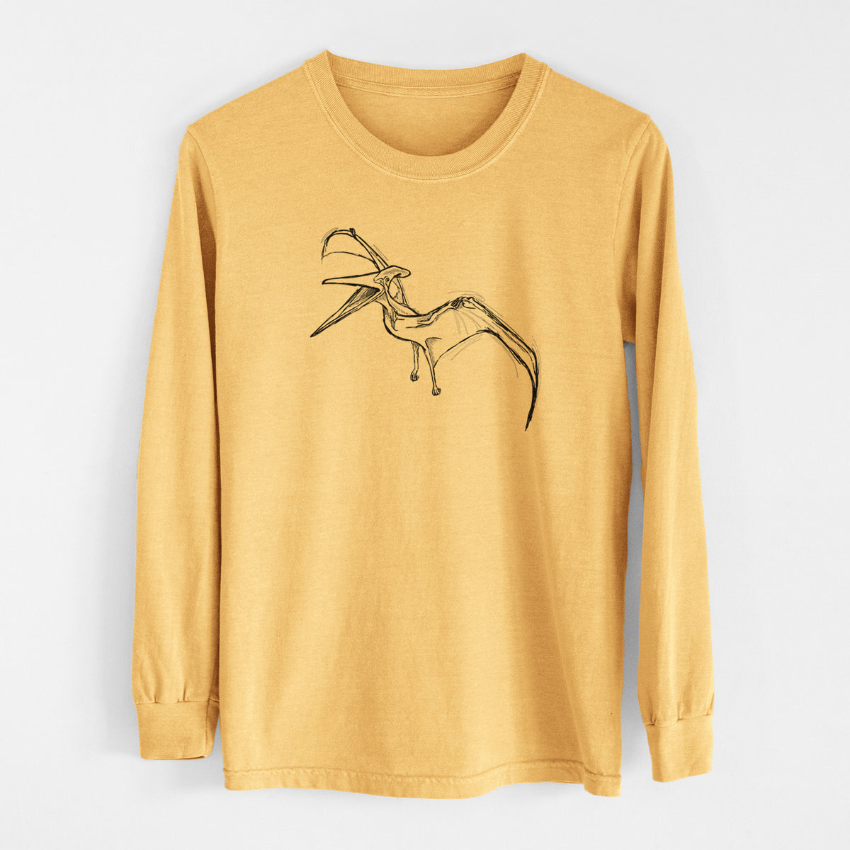 Golden wheat yellow Comfort Colors long sleeve shirt laid flat, printed with a black ink illustration of a Pteranodon in flight.