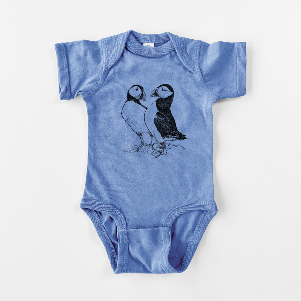 Carolina blue baby bodysuit laid flat, printed with a detailed black ink illustration of two Atlantic puffins standing side by side.