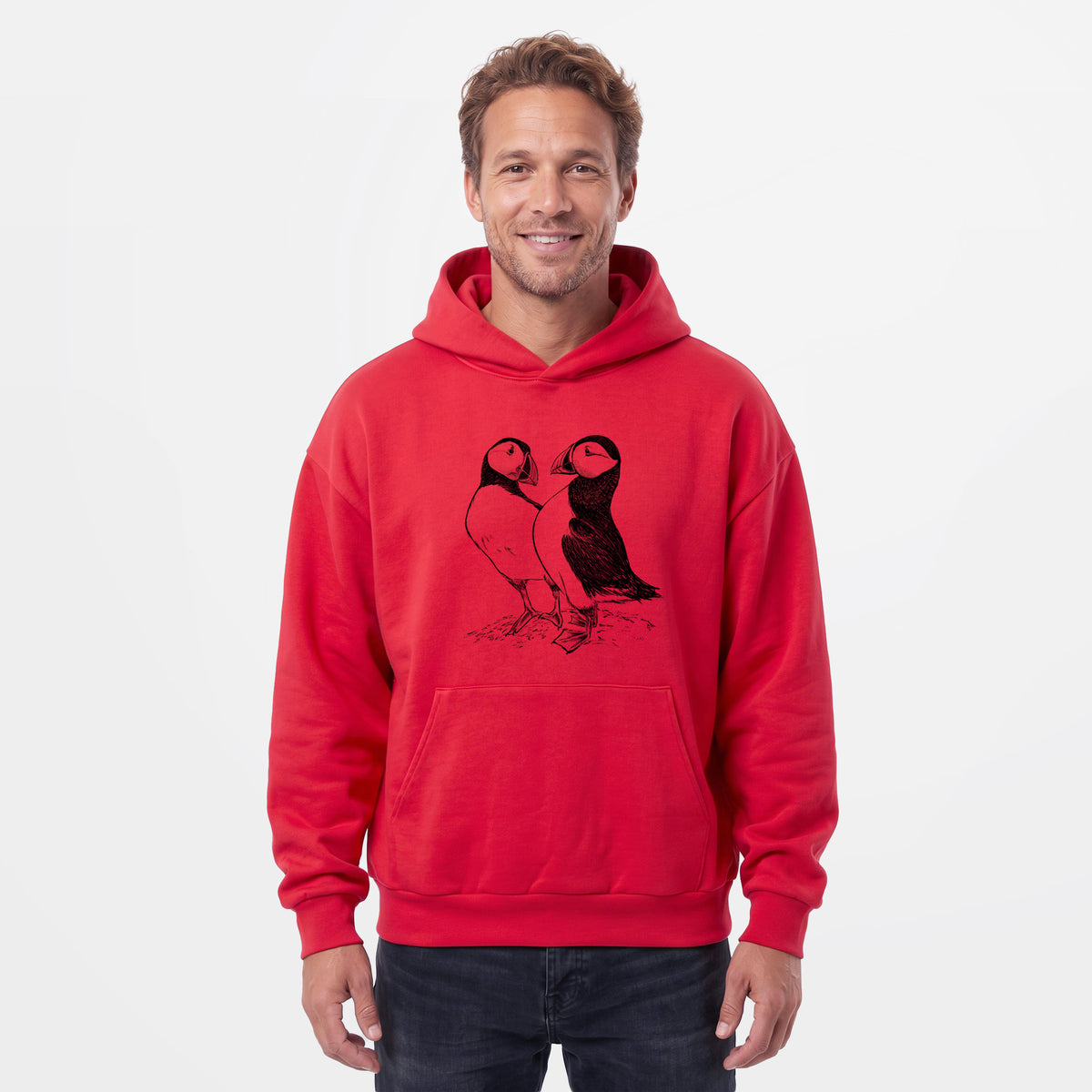 Male model wearing the Atlantic Puffins Pair - Fratercula arctica - Statement Midweight Hoodie.