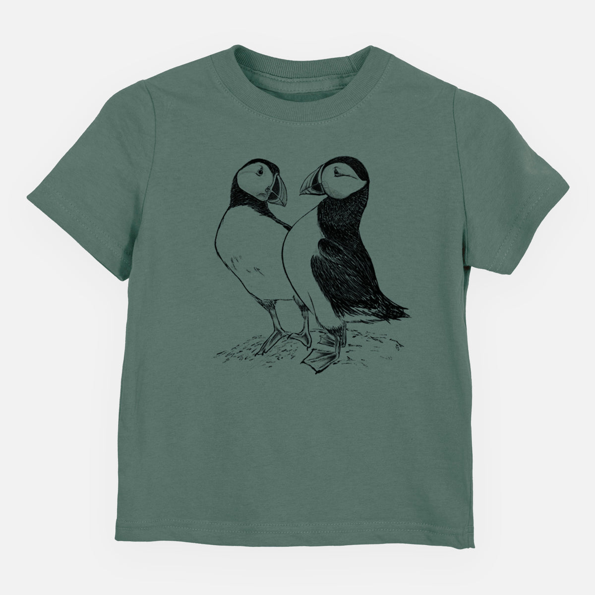 Basil green toddler t-shirt laid flat, printed with a detailed black ink illustration of two Atlantic puffins standing side by side.