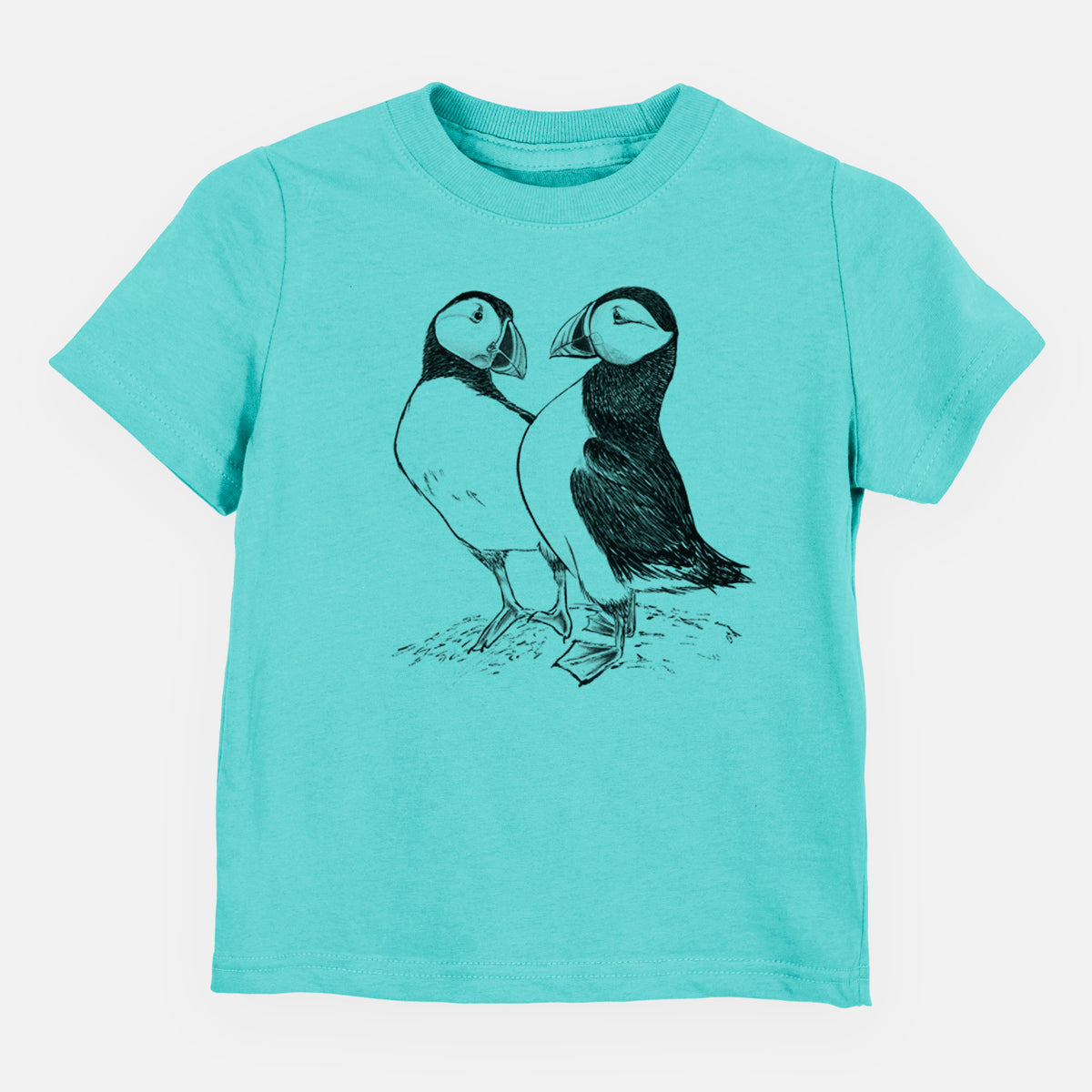 Caribbean blue toddler t-shirt laid flat, printed with a detailed black ink illustration of two Atlantic puffins standing side by side.