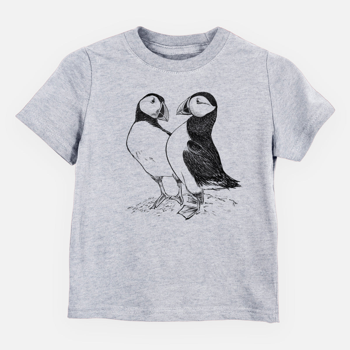 Heather grey toddler t-shirt laid flat, printed with a detailed black ink illustration of two Atlantic puffins standing side by side.