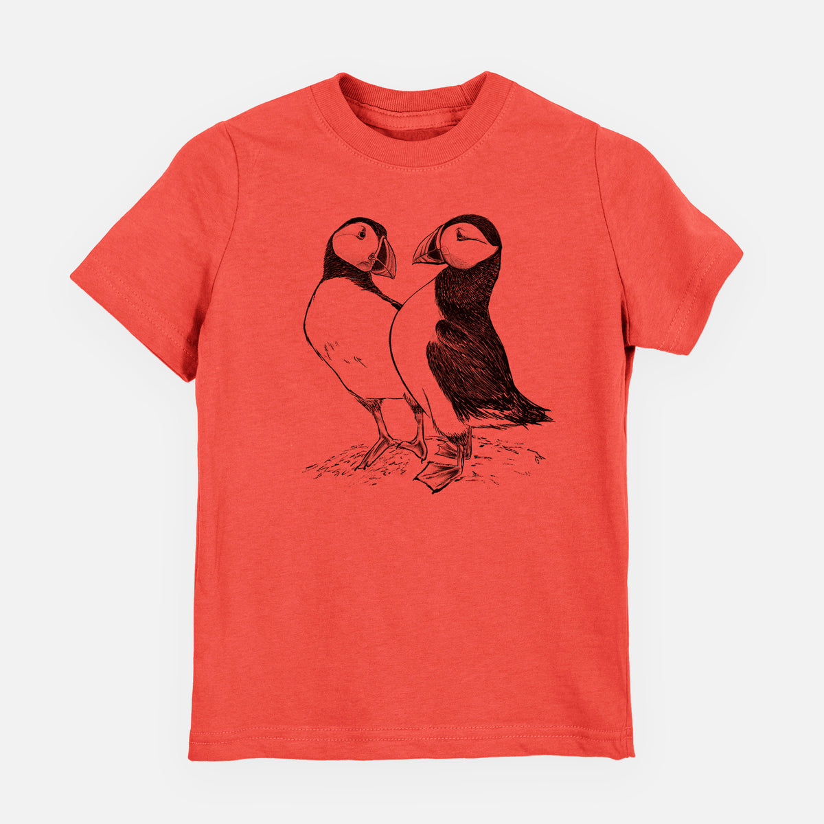 Passionfruit pink youth t-shirt laid flat, printed with a detailed black ink illustration of two Atlantic puffins standing side by side.