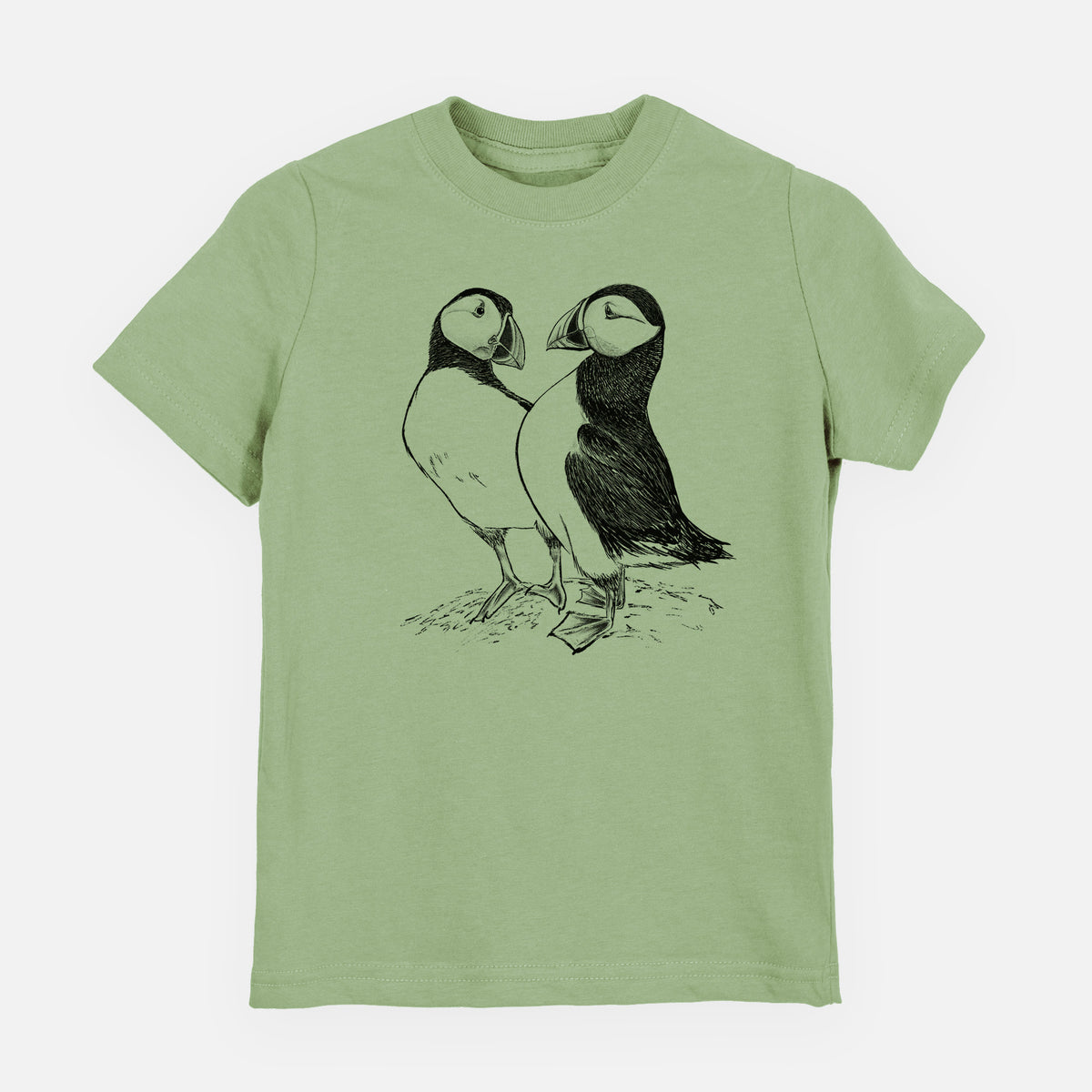 Sage green youth t-shirt laid flat, printed with a detailed black ink illustration of two Atlantic puffins standing side by side.