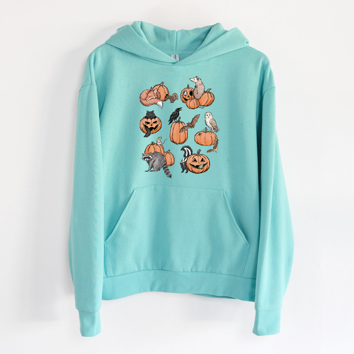 Woodland Pumpkin Patch Party - Statement Midweight Hoodie in Seafoam, hanging on a white wall, with a front kangaroo pocket and no drawcords.