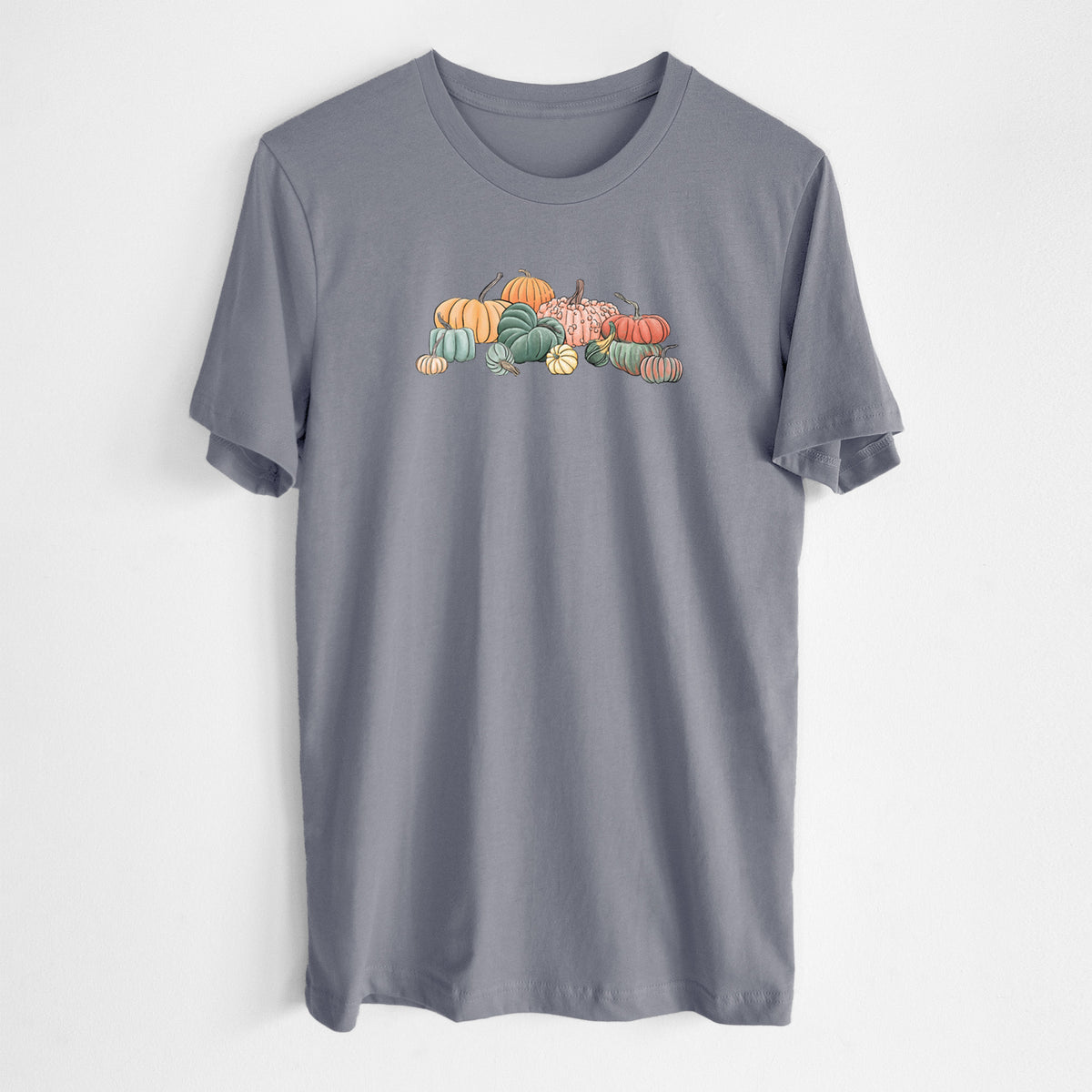 Storm grey lightweight cotton t-shirt laid flat, printed with a full-color illustration of a pile of pumpkins and gourds in orange, green and white.