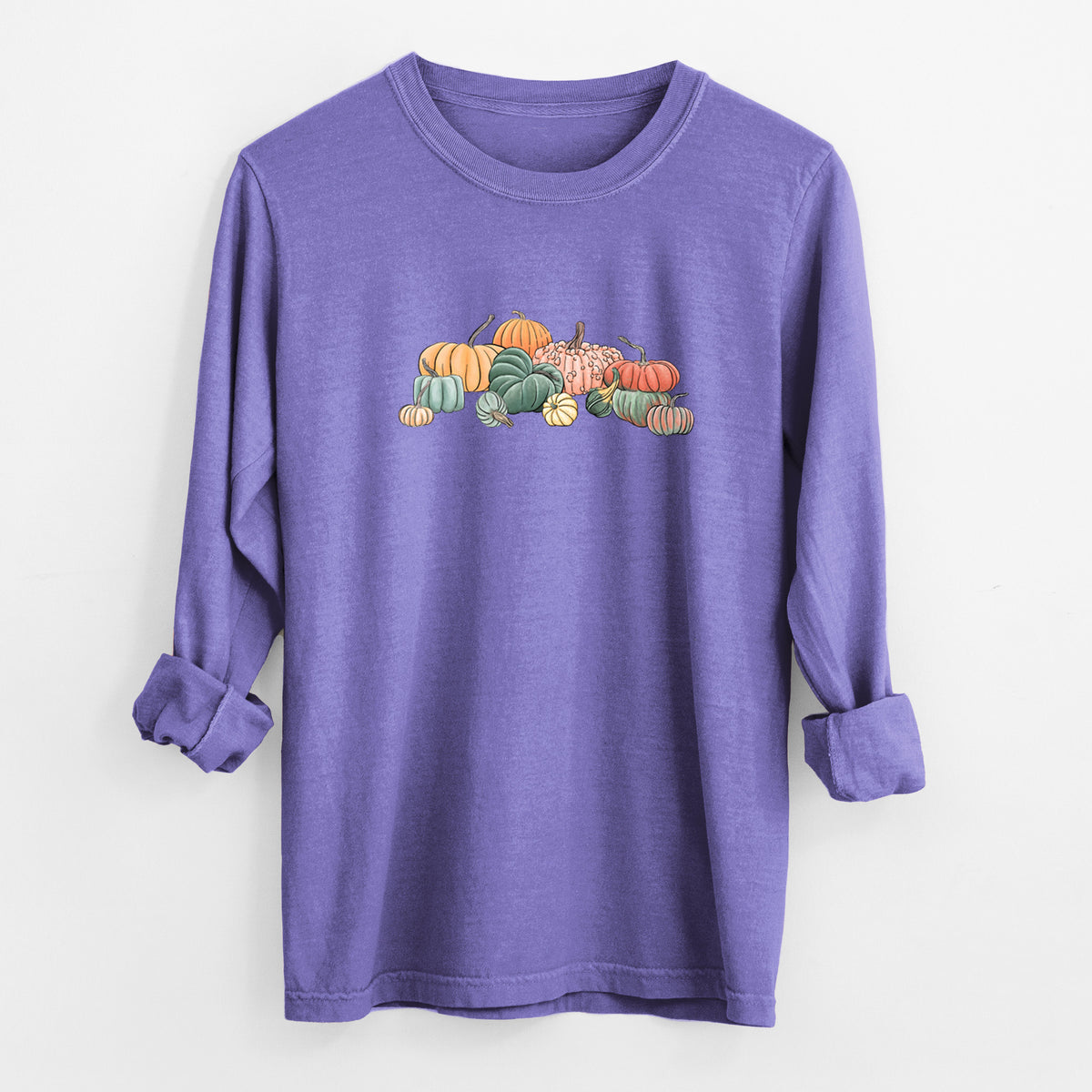 Violet purple Comfort Colors long sleeve shirt laid flat with the cuffs rolled, printed with a full-color illustration of a pile of pumpkins and gourds in orange, green and white.