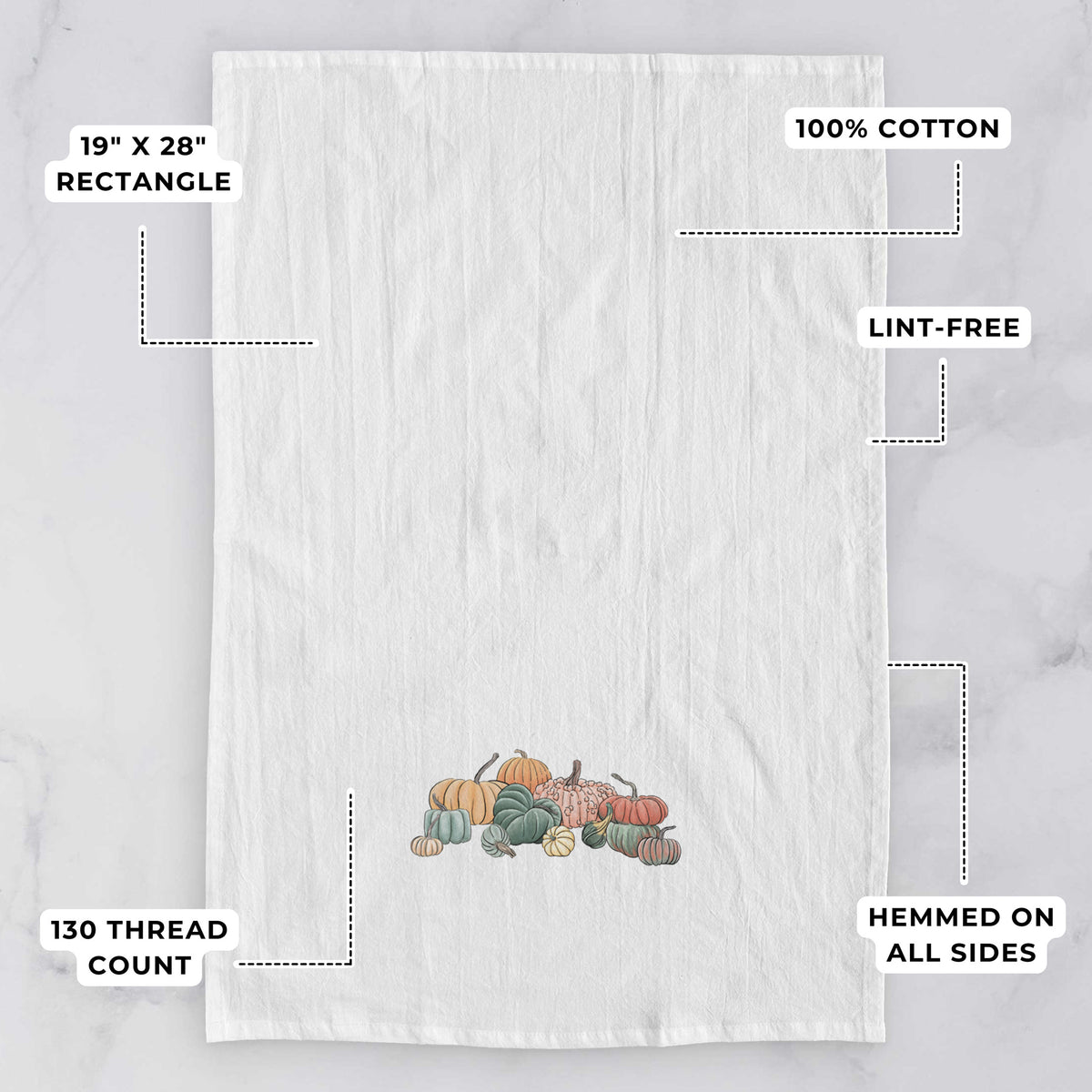 White tea towel printed with a full-color illustration of a pile of pumpkins and gourds in orange, green and white, with feature labels: 19 by 28 inch rectangle, 100% cotton, lint-free, 130 thread count, hemmed on all sides.