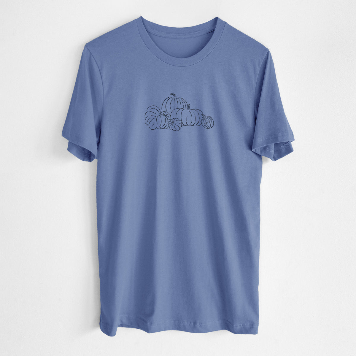 Blue bell lightweight cotton t-shirt laid flat, printed with a black ink line drawing of a pile of pumpkins.