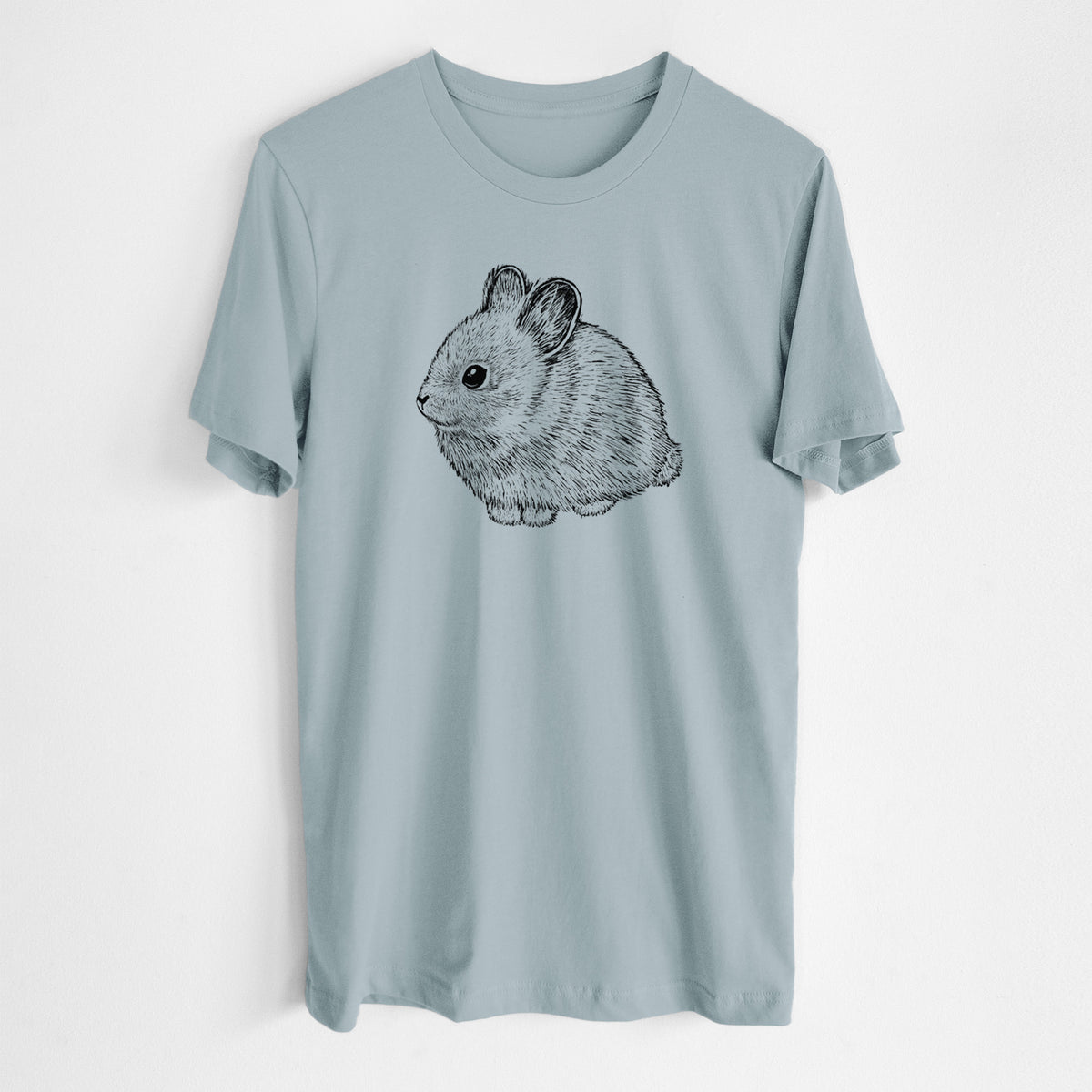 Vintage denim lightweight cotton t-shirt laid flat, printed with a detailed black ink illustration of a round, fluffy pygmy rabbit.