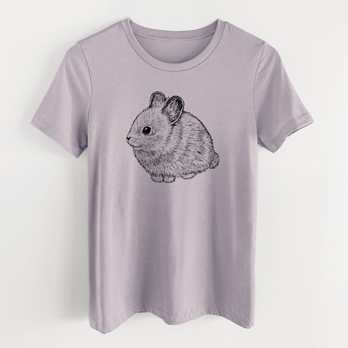 Light violet women's relaxed fit cotton t-shirt laid flat, printed with a detailed black ink illustration of a round, fluffy pygmy rabbit.