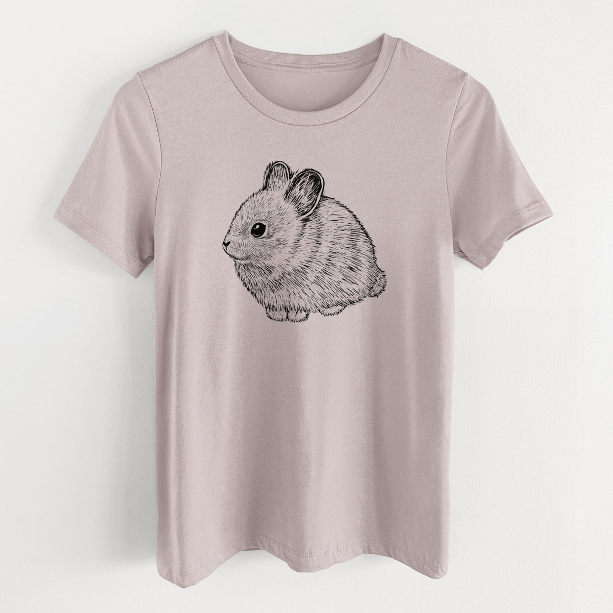 Pink gravel women's relaxed fit cotton t-shirt laid flat, printed with a detailed black ink illustration of a round, fluffy pygmy rabbit.