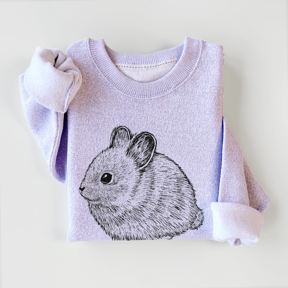 Ice purple knit sweatshirt printed with a detailed black ink illustration of a round, fluffy pygmy rabbit, styled flat.