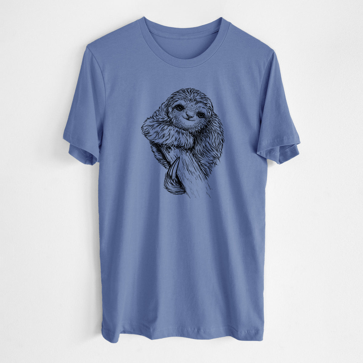 Blue bell lightweight cotton t-shirt laid flat, printed with a detailed black ink illustration of a smiling pygmy three-toed sloth hanging from a branch.