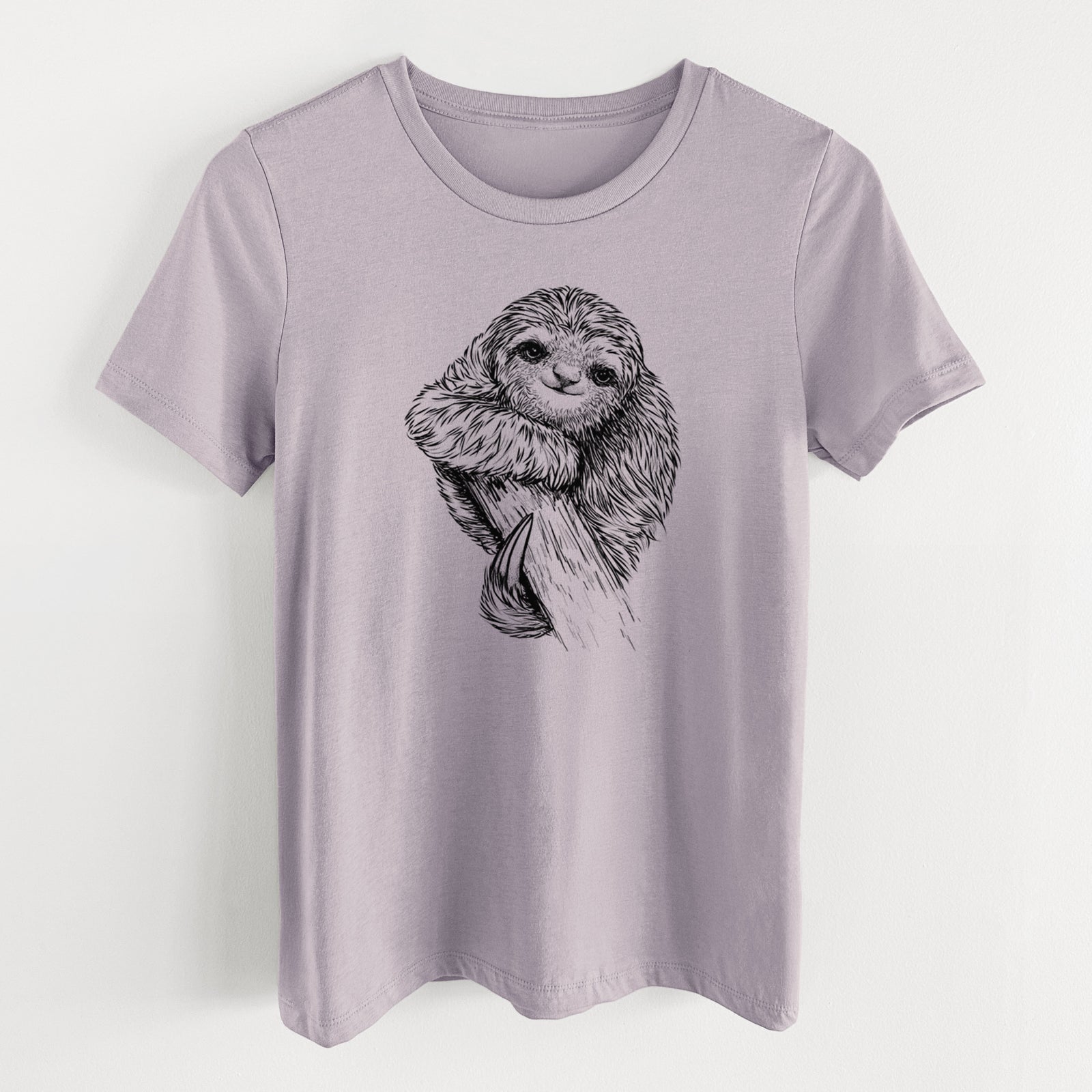 Light violet women's relaxed fit cotton t-shirt laid flat, printed with a detailed black ink illustration of a smiling pygmy three-toed sloth hanging from a branch.