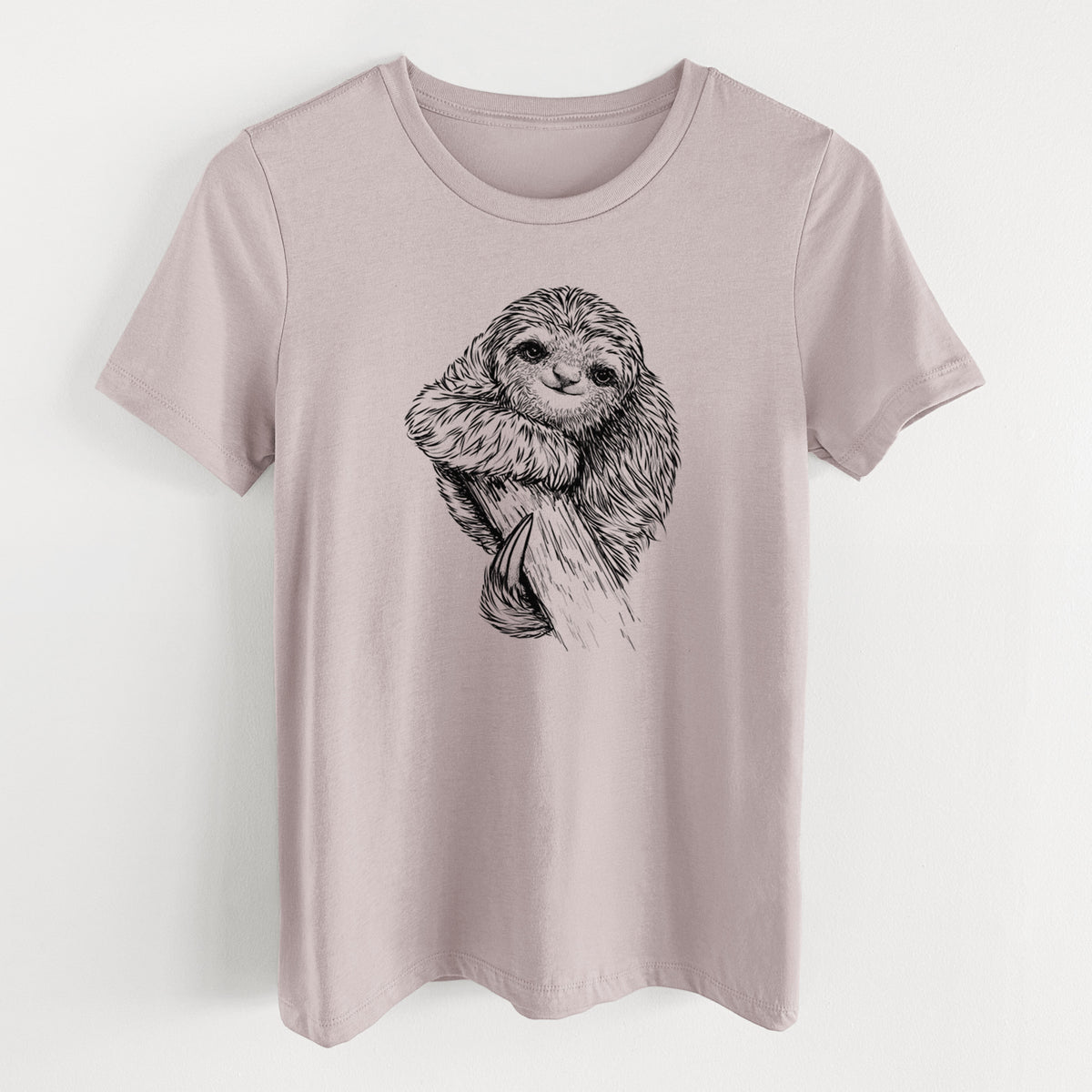 Pink gravel women's relaxed fit cotton t-shirt laid flat, printed with a detailed black ink illustration of a smiling pygmy three-toed sloth hanging from a branch.