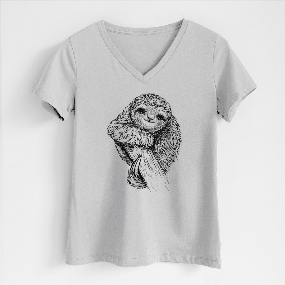 Lunar grey women's relaxed fit cotton V-neck t-shirt laid flat, printed with a detailed black ink illustration of a smiling pygmy three-toed sloth hanging from a branch.