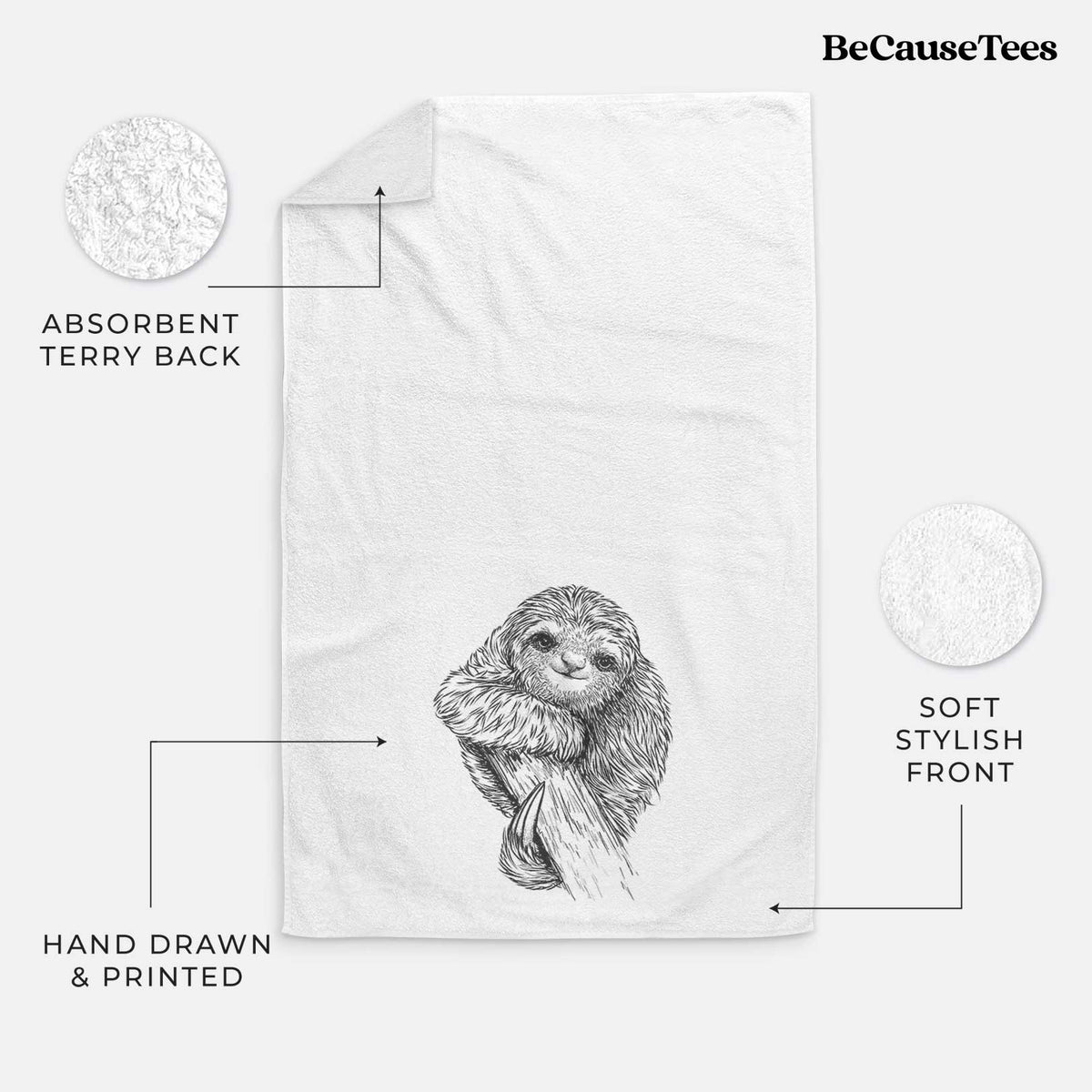 White hand towel printed with a detailed black ink illustration of a smiling pygmy three-toed sloth hanging from a branch.