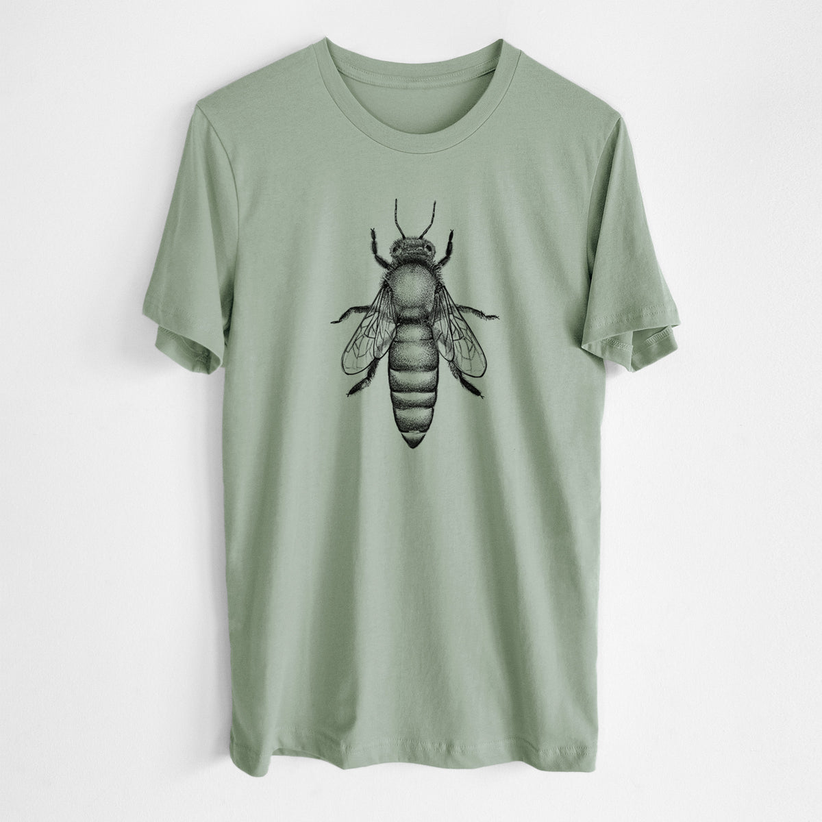 Sage green lightweight cotton t-shirt laid flat, printed with a detailed black ink illustration of a queen honey bee, seen from above.
