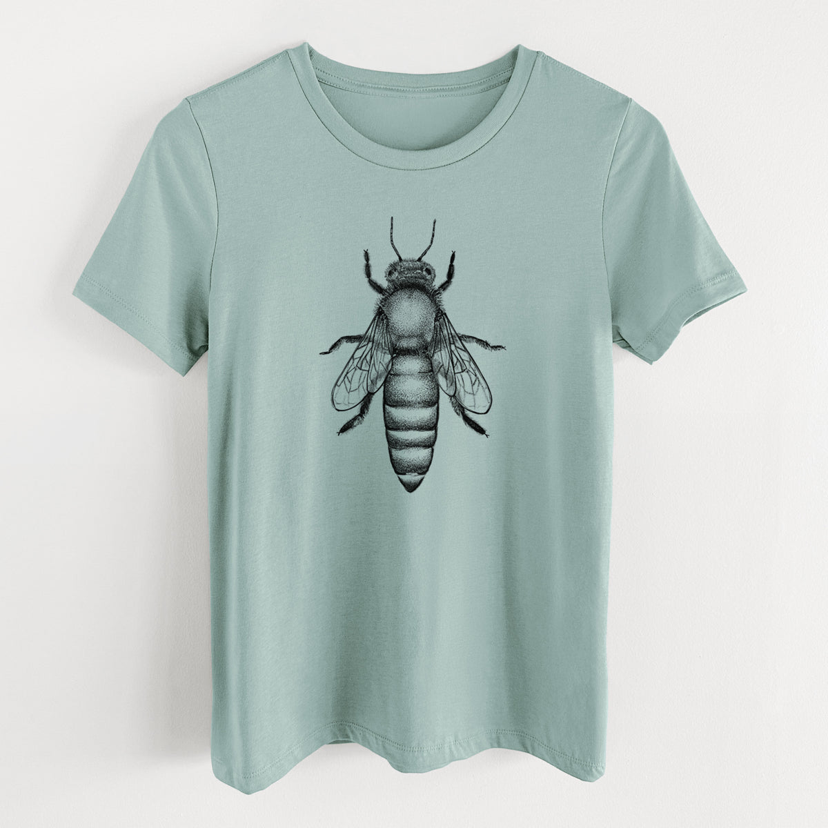 Dusty blue women's relaxed fit cotton t-shirt laid flat, printed with a detailed black ink illustration of a queen honey bee, seen from above.