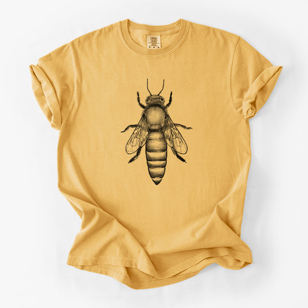 Golden wheat yellow Comfort Colors t-shirt laid flat, printed with a detailed black ink illustration of a queen honey bee, seen from above.