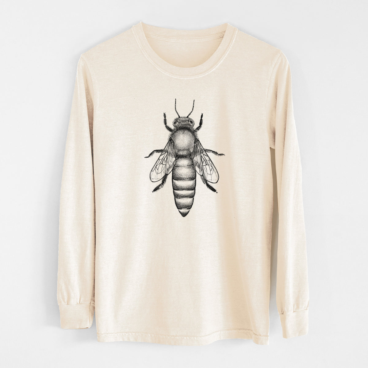 Ivory Comfort Colors long sleeve shirt laid flat, printed with a detailed black ink illustration of a queen honey bee, seen from above.
