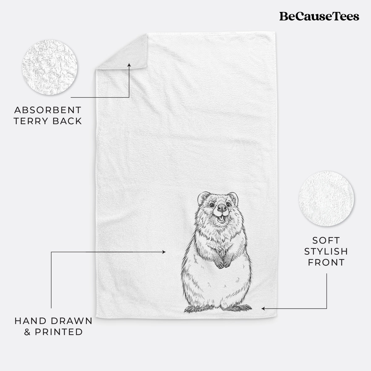 White hand towel printed with a black ink illustration of a smiling quokka sitting upright.