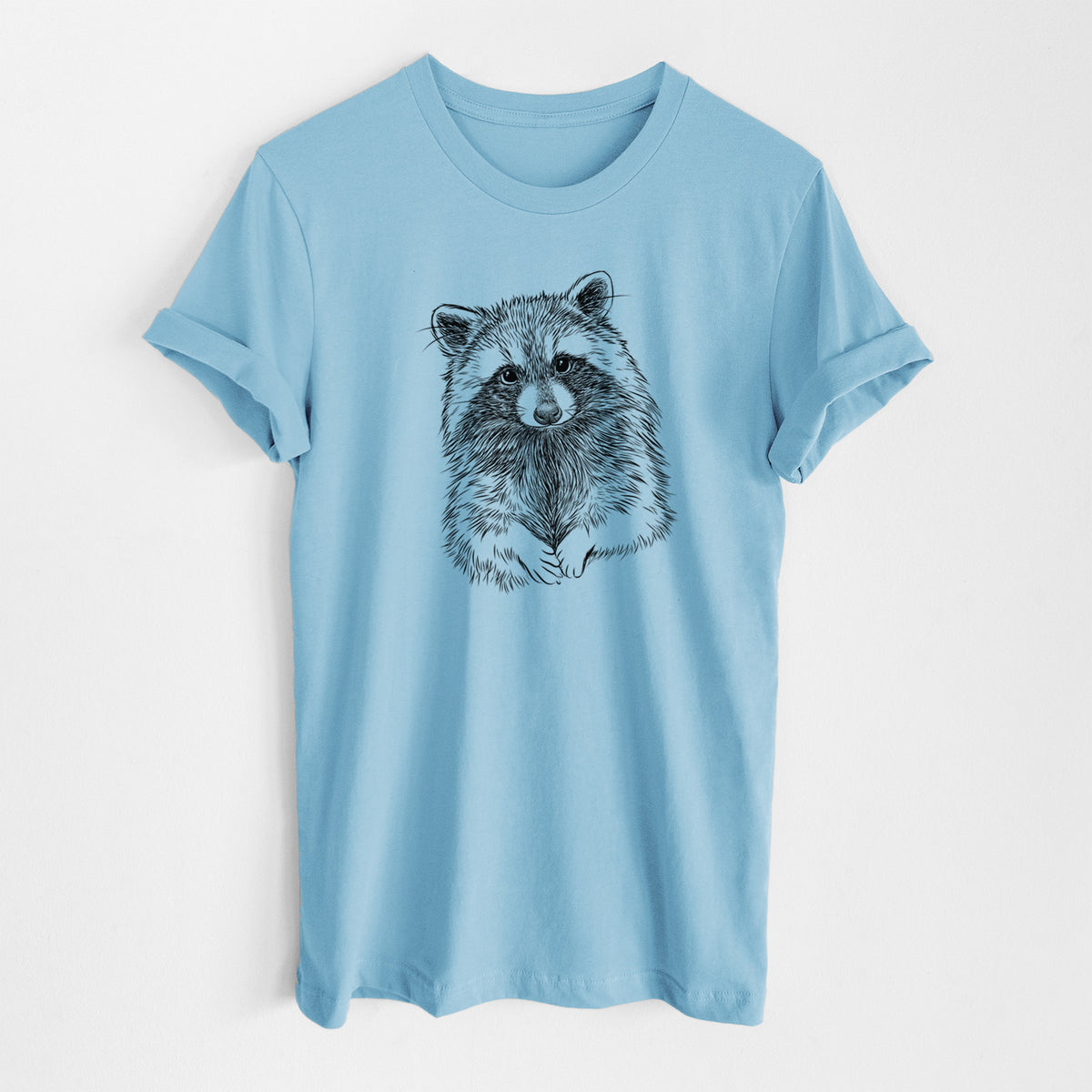 Ocean blue lightweight cotton t-shirt laid flat, printed with a detailed black ink portrait of a raccoon with its front paws resting in front of it.