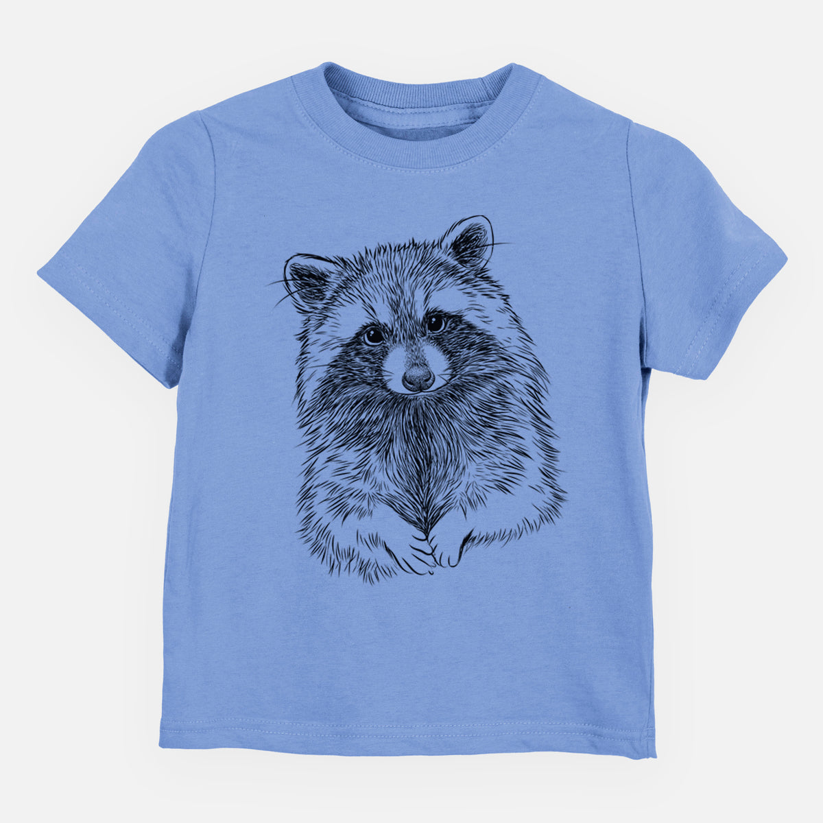 Carolina blue toddler t-shirt laid flat, printed with a detailed black ink portrait of a raccoon with its front paws resting in front of it.