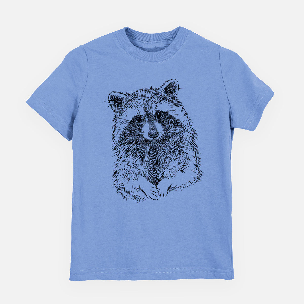 Carolina blue youth t-shirt laid flat, printed with a detailed black ink portrait of a raccoon with its front paws resting in front of it.