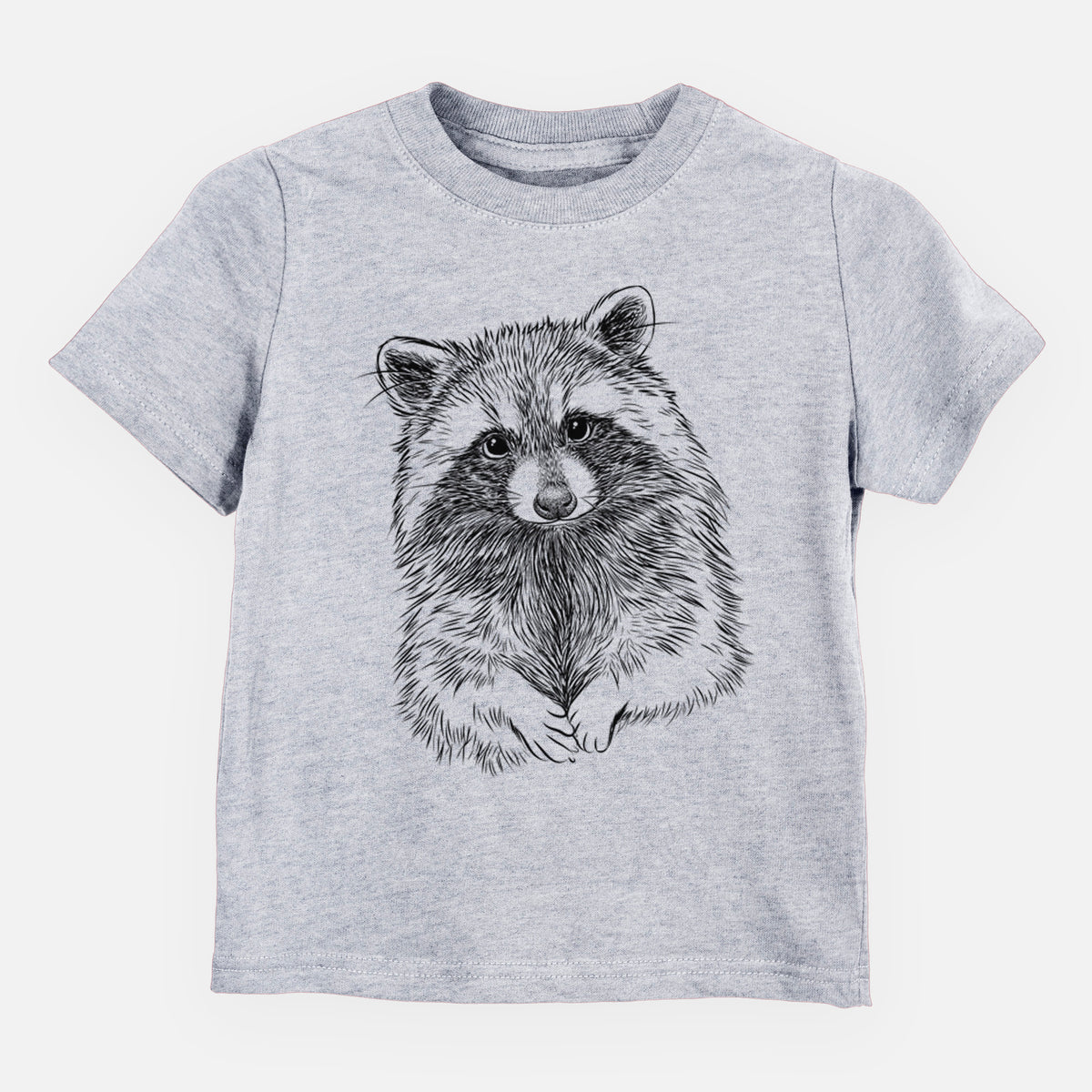 Heather grey toddler t-shirt laid flat, printed with a detailed black ink portrait of a raccoon with its front paws resting in front of it.