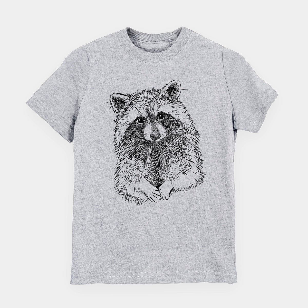 Heather grey youth t-shirt laid flat, printed with a detailed black ink portrait of a raccoon with its front paws resting in front of it.