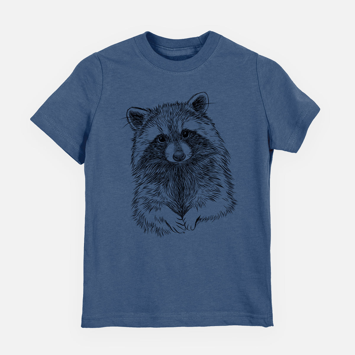 Indigo blue youth t-shirt laid flat, printed with a detailed black ink portrait of a raccoon with its front paws resting in front of it.
