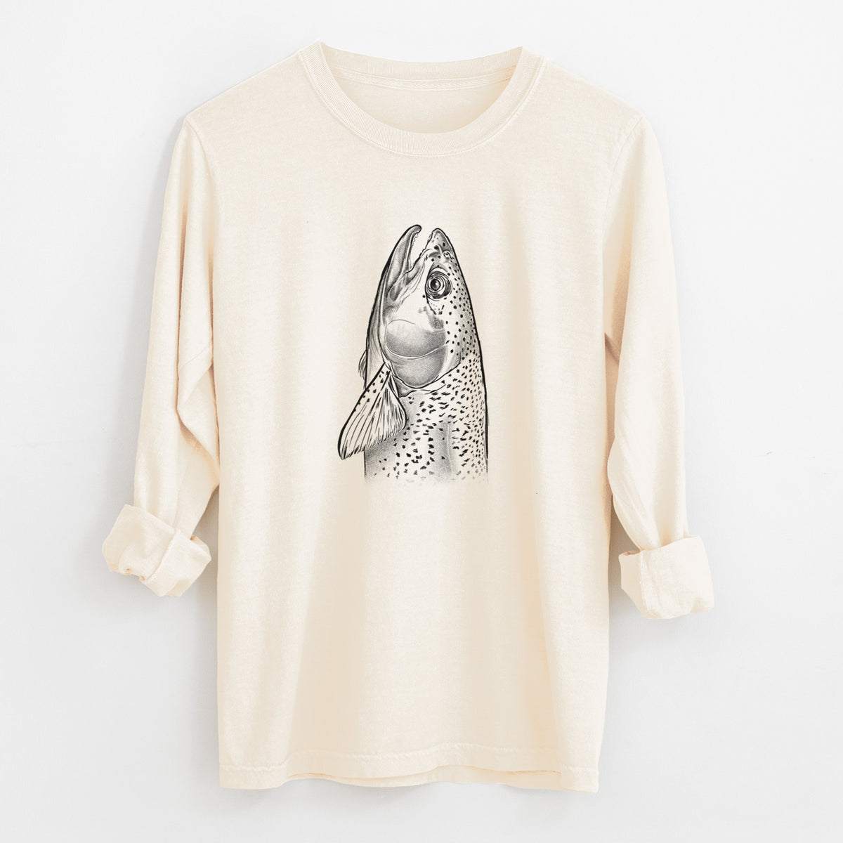 Ivory Comfort Colors long sleeve shirt laid flat with the cuffs rolled, printed with a detailed black ink illustration of a rainbow trout's head pointing upward, showing its spotted scales.