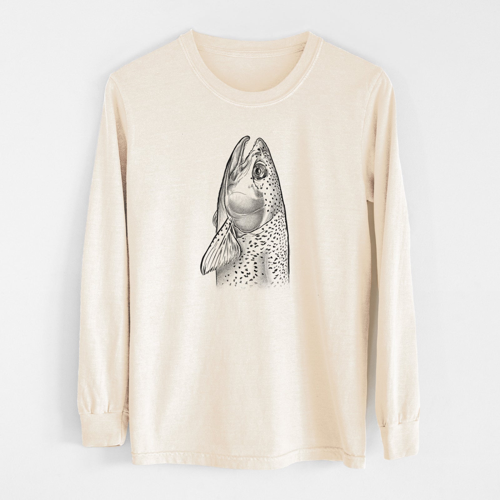 Ivory Comfort Colors long sleeve shirt laid flat, printed with a detailed black ink illustration of a rainbow trout's head pointing upward, showing its spotted scales.