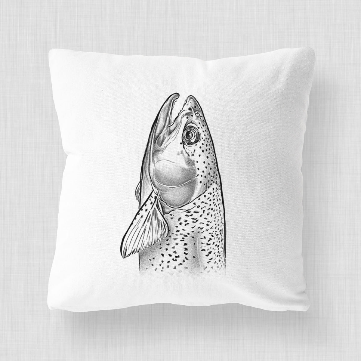 White pillow cover printed with a detailed black ink illustration of a rainbow trout's head pointing upward, showing its spotted scales.