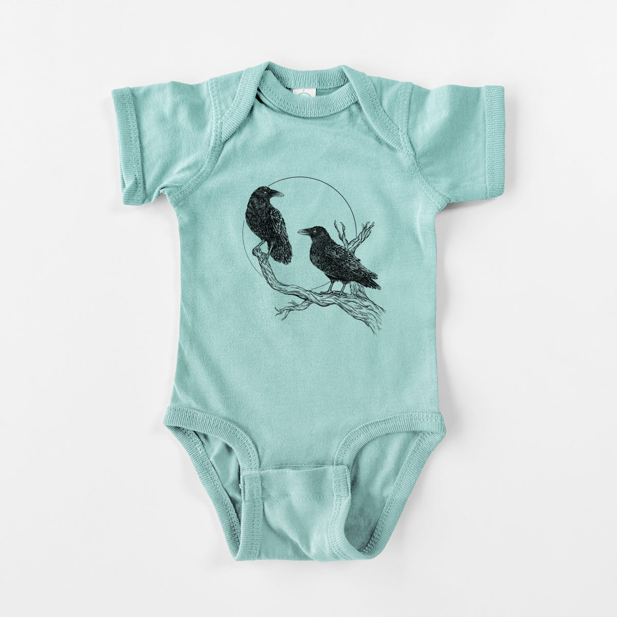 Saltwater baby bodysuit laid flat, printed with a black ink illustration of two ravens perched on a branch in front of a full moon.