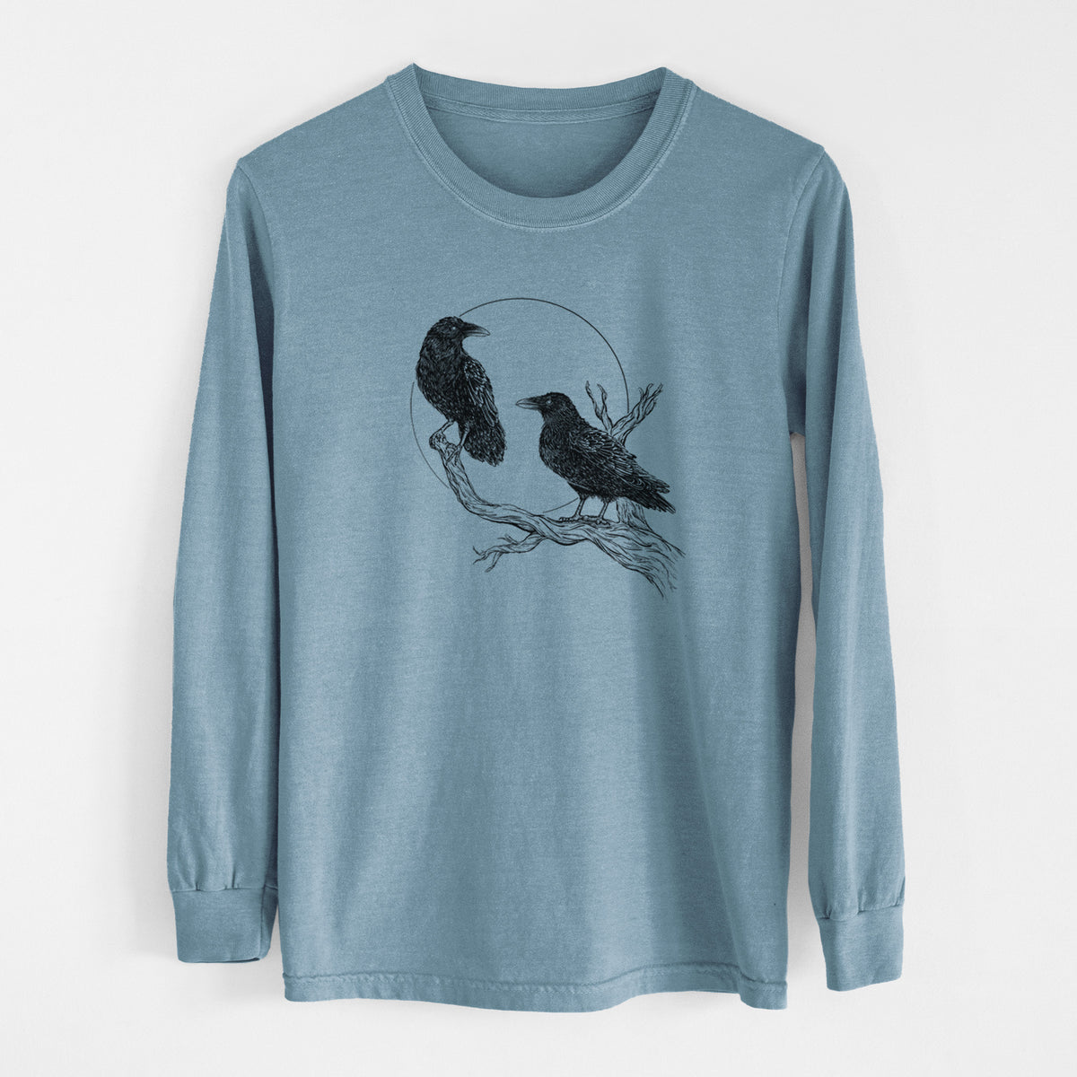 Steel blue Comfort Colors long sleeve shirt laid flat, printed with a black ink illustration of two ravens perched on a branch in front of a full moon.