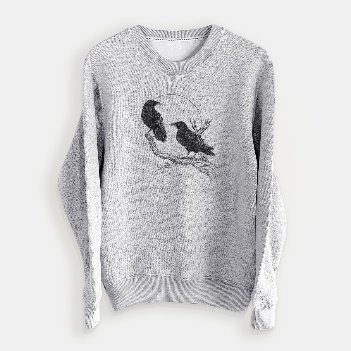 Salt and pepper knit sweatshirt laid flat, printed with a black ink illustration of two ravens perched on a branch in front of a full moon.