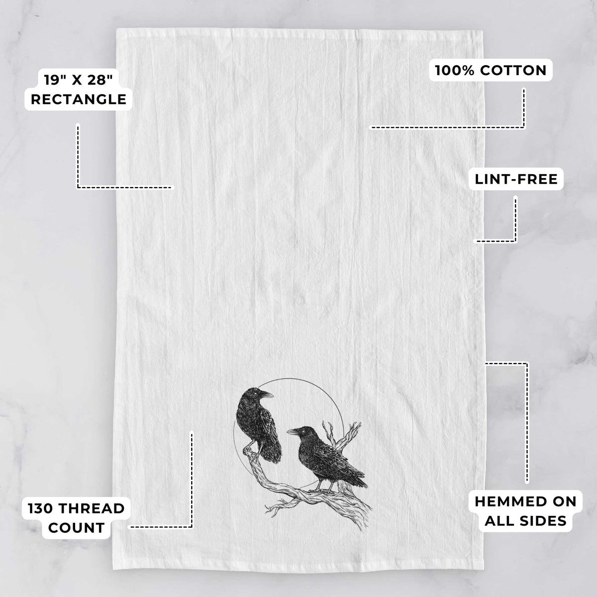White tea towel printed with a black ink illustration of two ravens perched on a branch in front of a full moon, with feature labels: 19 by 28 inch rectangle, 100% cotton, lint-free, 130 thread count, hemmed on all sides.
